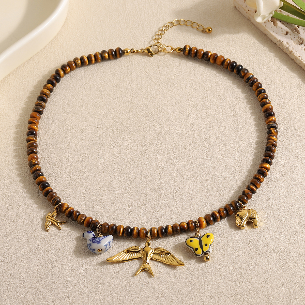 Vintage Multi Animal Charm Tig - مراجعة Butterfly Clasp Deployant وسعره