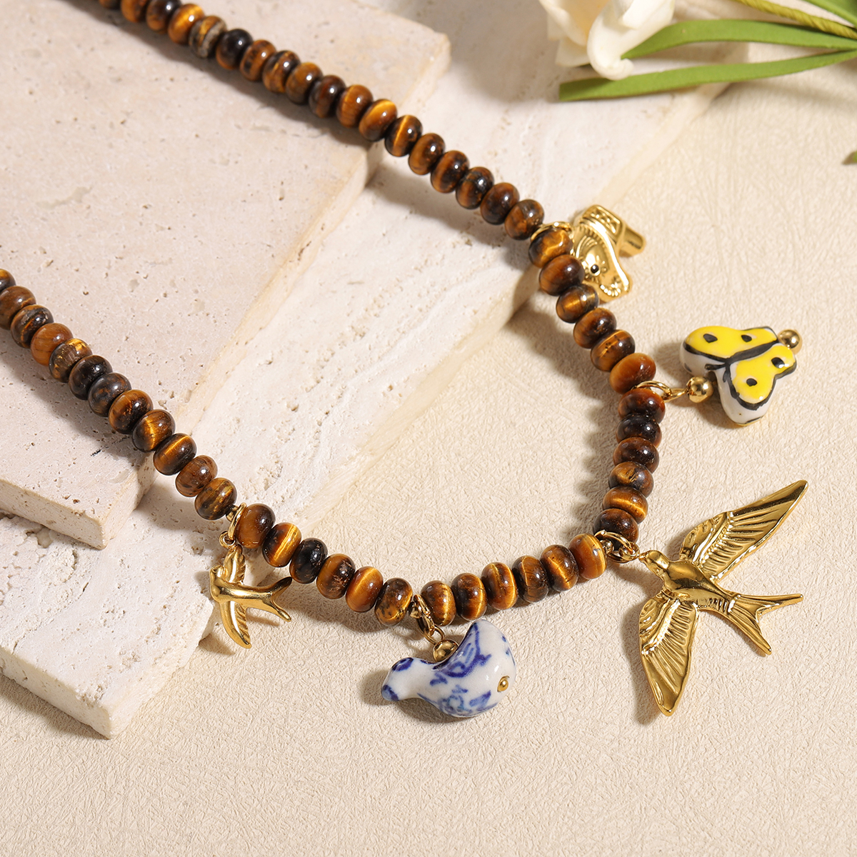 Vintage Multi Animal Charm Tig - مراجعة Butterfly Clasp Deployant وسعره